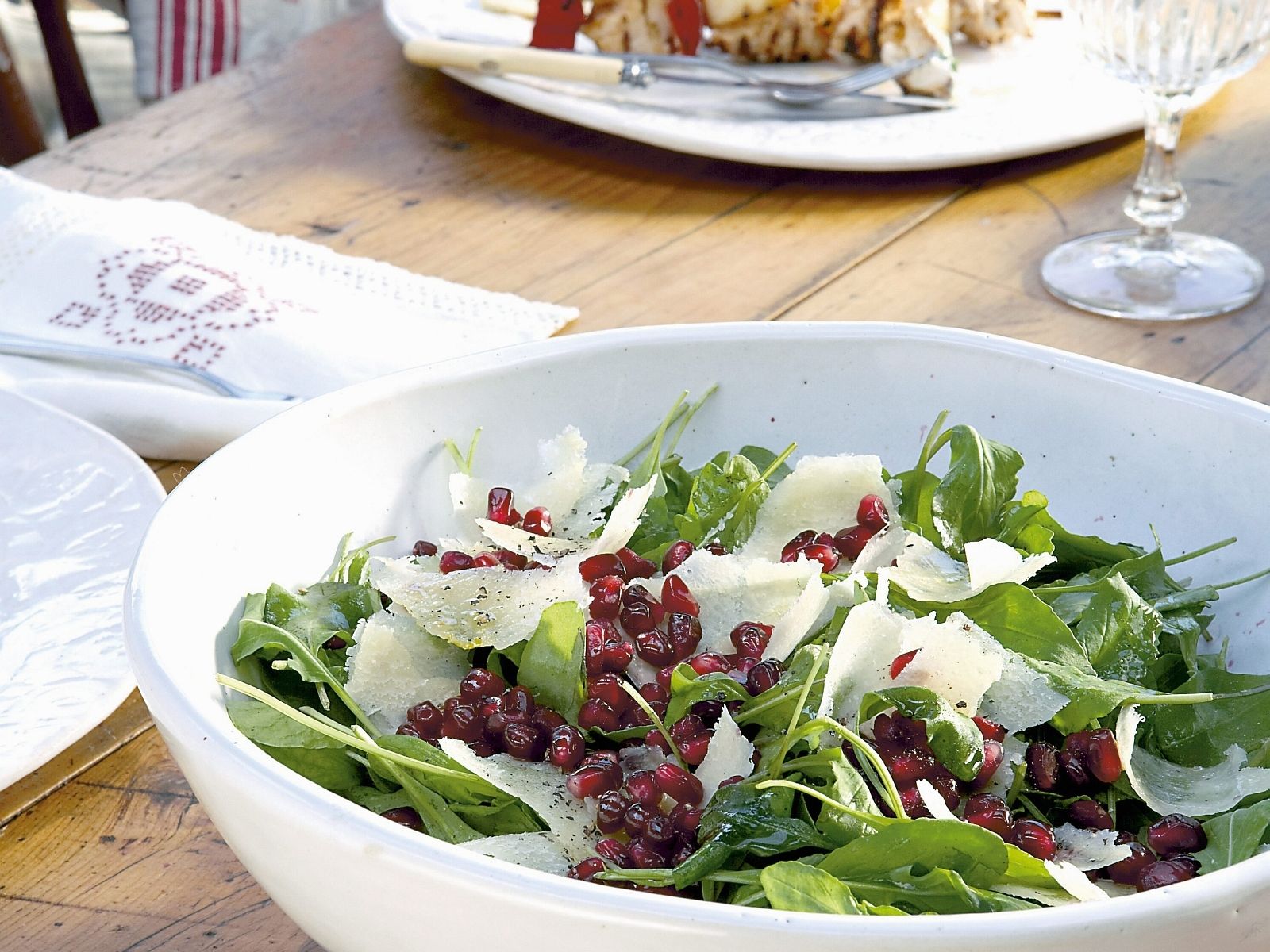 Brussels Sprouts Arugula Salad with Pomegranate and Parmesan